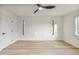 A bright bedroom with sleek ceiling fan and plenty of natural light at 6739 E Thunderbird Rd, Scottsdale, AZ 85254