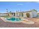 Backyard oasis with refreshing pool, lush green turf, and stylish desert landscaping for outdoor enjoyment at 6739 E Thunderbird Rd, Scottsdale, AZ 85254