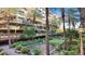 Stunning common area with water feature, putting green, lounge chairs, and vibrant foliage at 7151 E Rancho Vista Dr # 3001, Scottsdale, AZ 85251