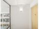 Bright hallway with modern lighting and views of the building exterior at 7151 E Rancho Vista Dr # 3001, Scottsdale, AZ 85251