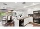 Open kitchen flowing into the dining area, featuring high-end appliances at 7151 E Rancho Vista Dr # 3001, Scottsdale, AZ 85251