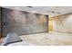 Spacious lobby with stone tiled floors and a modern bench at 7151 E Rancho Vista Dr # 3001, Scottsdale, AZ 85251