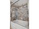 Updated bathroom featuring subway tile shower with glass doors and stainless steel fixtures at 7151 E Rancho Vista Dr # 3001, Scottsdale, AZ 85251