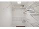 Organized walk-in closet featuring ample shelving and storage space at 7151 E Rancho Vista Dr # 3001, Scottsdale, AZ 85251