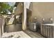 View of back patio with decorative pavers, and access to the interior at 7240 N Dreamy Draw Dr # 109, Phoenix, AZ 85020