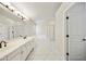 A bathroom features a vanity with double sinks, a separate bathtub and a shower at 7240 N Dreamy Draw Dr # 109, Phoenix, AZ 85020