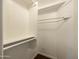 A well-organized walk-in closet with white shelves and wooden floor at 7240 N Dreamy Draw Dr # 109, Phoenix, AZ 85020
