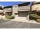 Multi-level townhome featuring a two-car garage and well-maintained landscaping in a desirable neighborhood at 7240 N Dreamy Draw Dr # 109, Phoenix, AZ 85020
