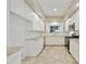 Bright kitchen with white cabinetry, stainless-steel appliances, and granite countertops at 7240 N Dreamy Draw Dr # 109, Phoenix, AZ 85020