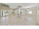 A spacious living area is brightened by natural light, enhancing the tiled floor and neutral-toned walls at 7240 N Dreamy Draw Dr # 109, Phoenix, AZ 85020