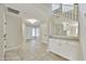Bright living room featuring neutral colors, tiled floors, and a staircase with white railing at 7240 N Dreamy Draw Dr # 109, Phoenix, AZ 85020