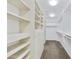 Spacious walk-in closet with custom shelving and ample storage at 7240 N Dreamy Draw Dr # 109, Phoenix, AZ 85020