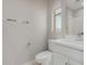 Bright bathroom with toilet, large white sink and a modern faucet at 820 N 8Th Ave # 25, Phoenix, AZ 85007
