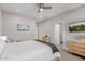 This bedroom showcases a queen size bed and access to the bathroom at 820 N 8Th Ave # 25, Phoenix, AZ 85007