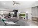 Open concept living area flows to kitchen with stainless steel appliances and island at 820 N 8Th Ave # 25, Phoenix, AZ 85007