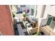 Private patio space offers outdoor living, accessible via a gate, and complemented by a cozy upper level balcony at 820 N 8Th Ave # 25, Phoenix, AZ 85007