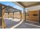 Comfortable backyard patio under a covered metal pergola at 8872 W Hollywood Ave, Peoria, AZ 85345
