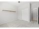 This bedroom has a built-in shelf and a sliding closet door at 8872 W Hollywood Ave, Peoria, AZ 85345