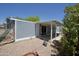Exterior view of backyard with covered patio area for entertaining and relaxation at 9733 E Baywood Ave, Mesa, AZ 85208