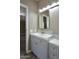 Bathroom featuring a modern vanity and sink with neutral walls and modern fixtures at 9733 E Baywood Ave, Mesa, AZ 85208