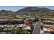 Aerial view of home with red pin, showcasing its prime location with mountain views at 1023 E Sahuaro Dr, Phoenix, AZ 85020