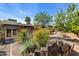 Landscaped backyard featuring a desert landscape and stone border providing privacy at 1023 E Sahuaro Dr, Phoenix, AZ 85020