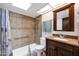 Bathroom features walk in shower and vanity with sink at 1023 E Sahuaro Dr, Phoenix, AZ 85020