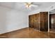 Cozy bedroom with closet and door to other room, creating a comfortable retreat at 1023 E Sahuaro Dr, Phoenix, AZ 85020