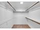 Walk-in closet with shelf and rod organization system at 1023 E Sahuaro Dr, Phoenix, AZ 85020