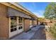 Exterior view of a home with a covered patio and well-maintained landscaping at 1023 E Sahuaro Dr, Phoenix, AZ 85020