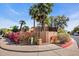 Street corner view of home featuring lush landscaping, a fire hydrant, and street signage at 1023 E Sahuaro Dr, Phoenix, AZ 85020