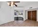 Entrance foyer offers tile flooring and a view to the front living area and front doors at 1023 E Sahuaro Dr, Phoenix, AZ 85020