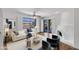 Comfortable living room featuring an inviting fireplace and outdoor access at 1023 E Sahuaro Dr, Phoenix, AZ 85020