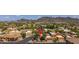 Neighborhood aerial view of community homes featuring mature landscaping and mountain scenery at 1023 E Sahuaro Dr, Phoenix, AZ 85020