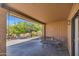 Covered patio area with plenty of seating and shade, perfect for outdoor relaxation at 1023 E Sahuaro Dr, Phoenix, AZ 85020