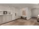Inviting entryway features beautiful hardwood floors, stylish built-in cabinetry, and modern decor at 106 E Echo Ln, Phoenix, AZ 85020