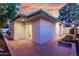 Brick patio featuring a door and large windows providing ample light to the property at 106 E Echo Ln, Phoenix, AZ 85020
