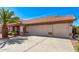 Attractive home featuring a well-maintained lawn, tile roofing, decorative columns, and a spacious three-car garage at 10937 N Ventana W Dr, Peoria, AZ 85373