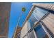 Modern exterior with large windows and a stone accent wall, capturing natural light at 1123 E Maryland Ave # 4, Phoenix, AZ 85014