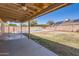 Large backyard with covered patio and fenced pool area perfect for outdoor entertaining at 1202 W Wickieup Ln, Phoenix, AZ 85027