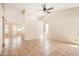 Inviting living room with tile floors, ceiling fan, and views to other rooms at 1202 W Wickieup Ln, Phoenix, AZ 85027