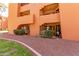 Exterior view of the building with well-maintained landscaping at 12212 N Paradise Vlg S Pkwy # 113, Phoenix, AZ 85032