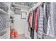 Organized closet with shelves and hanging space for clothing and accessories at 12212 N Paradise Vlg S Pkwy # 113, Phoenix, AZ 85032