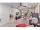 Spacious living room with a sliding glass door to outdoor patio and stylish furnishings at 12212 N Paradise Vlg S Pkwy # 113, Phoenix, AZ 85032