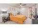 Inviting bedroom with a comfortable bed, ceiling fan, and ample natural light at 12212 N Paradise Vlg S Pkwy # 113, Phoenix, AZ 85032