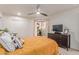 Well-lit bedroom features modern decor, sliding door access and comfortable furniture at 12212 N Paradise Vlg S Pkwy # 113, Phoenix, AZ 85032