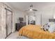 Cozy bedroom with backyard access, stylish decor, and ample storage space at 12212 N Paradise Vlg S Pkwy # 113, Phoenix, AZ 85032
