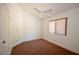 Carpeted bedroom features a window with blinds and a ceiling fan at 12965 N 95Th Way, Scottsdale, AZ 85260