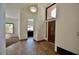 A view of the entry foyer featuring tile floors and a high ceiling at 12965 N 95Th Way, Scottsdale, AZ 85260
