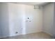 Unfinished basement with utility connections and tile flooring at 1410 S 24Th Ave, Phoenix, AZ 85009
